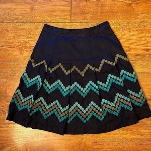 Navy Embroidered A-Line, Mid-Length Skirt. Pleated. Used, Like New